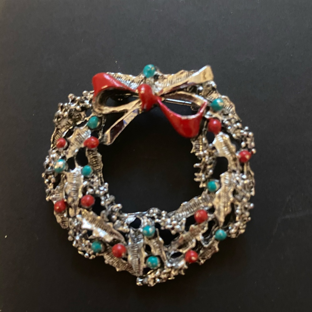 Elegant Silver Wreath Brooch with Red and Teal Accents